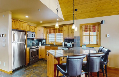Big White Ski Resort Cabin | Woodcutter Cabin 16 | Snowy ski-in/out getaway with private hot tub & fireplaces
