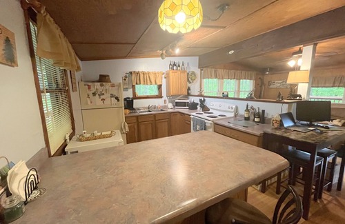 Thayerville Cabin | Wooded camp w/lake views/fire pit. Great location.