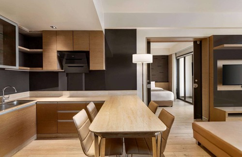 Sanand Hotel | Wyndham Ahmedabad Shela