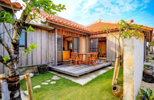 Minatogawa Villa | YACHIMUN Terrace ～シーサーが見守る小さな漁村の宿 ～