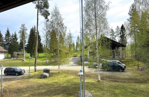Tahkovuori House | Yläkerran asunto parvekkeella ja saunalla