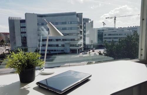 Turku Apartment | Yliopiston lähellä kodikas ja valoisa kolmio työhuoneella