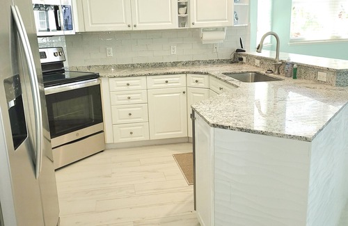 Old Man Bay Condo | YOU'VE Arrived! Beachfront 3BR condo w/Pool-Relax. North Side near Rum Point