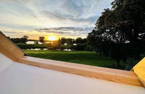 Bremervoerde House | Young dyke house Idyllically situated on the Oste with a view of Lake Vörder