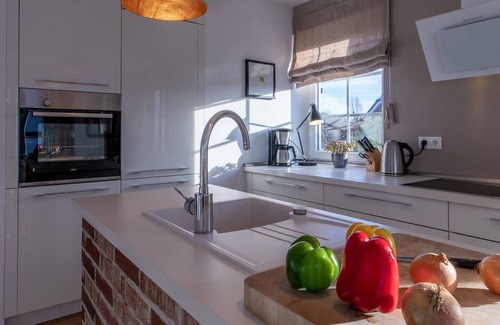 Dranske House | Your cottage with garden, bright, cozy and the sea in sight