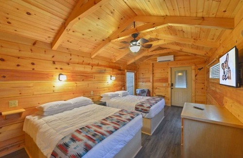 Bryan Cabin | Your Home Away From Home! Patio, Outdoor Pool, Pets are Allowed Here!