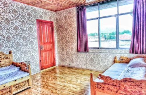 Daocheng House | Zishuo Zihua Guest House