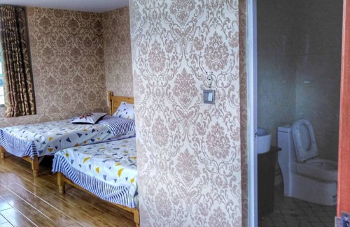 Daocheng House | Zishuo Zihua Guest House