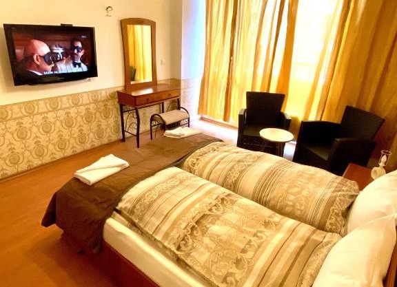 Стаи за гости на централно място в София с обслужване