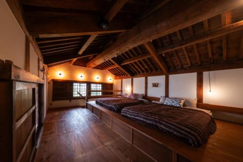 源泉かけ流しの一棟貸し温泉宿The Bath & Bed Dogo