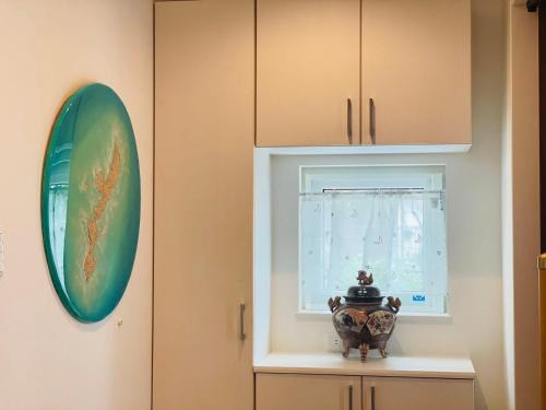 空港まで車で15分ビーチまで徒歩1分海沿いの閒雲斎