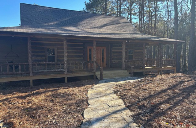 1850 log cabin with 2 br, 2 baths, W/D, mini split A/C, carport attached