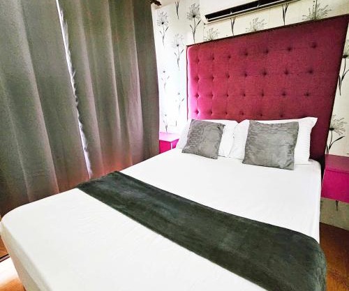 1BR Limketkai condo with WiFi, Netflix and Pool at One Oasis