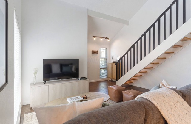 2 bed 2 bath condo with washer & dryer, parking garage, and office space