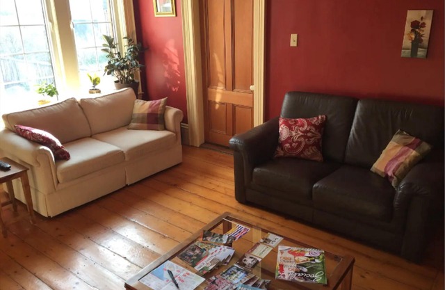 2 bedroom apt; old charm with modern living and huge patio with private parking