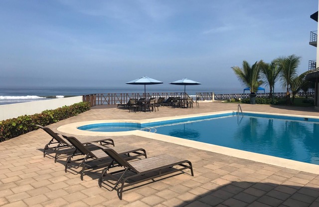 2 bedroom condo on beachfront with 23 meter pool, gated community