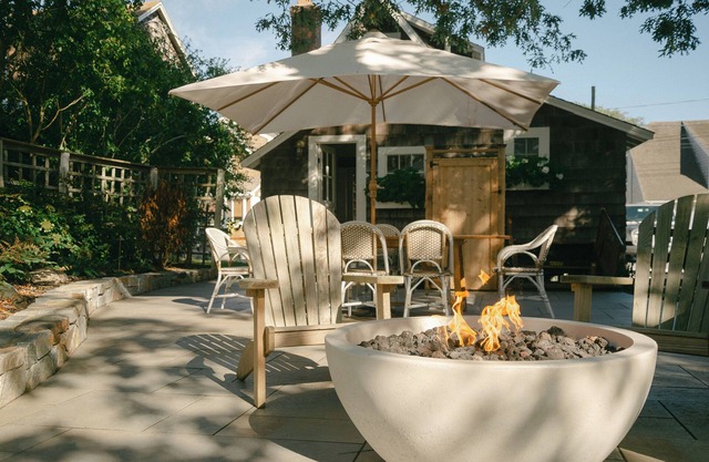 2-bedroom cottage with large outdoor patio and fire pit.