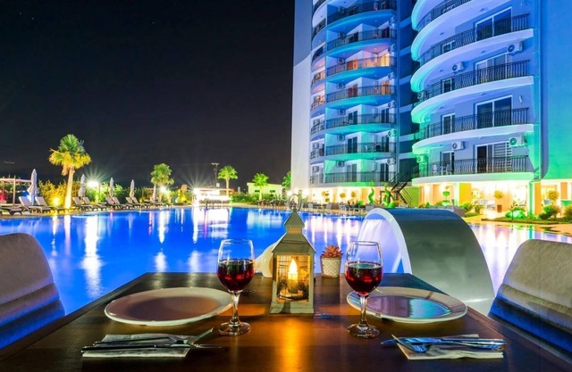 2-bedroom hotel apartment with pool , gym, sauna, spa in iskele