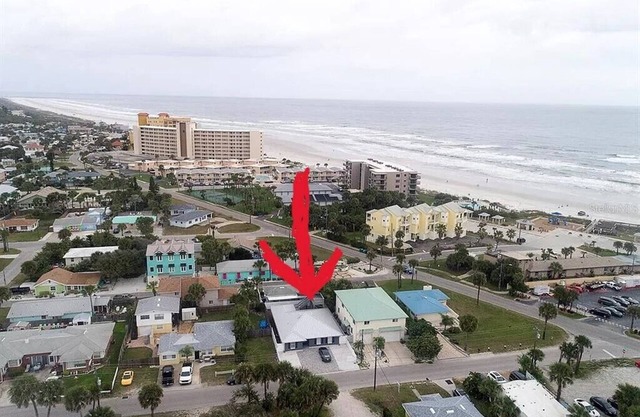 3rd house from beach with heated pool & tiki bar. 2 master suites + 2 bedrooms.