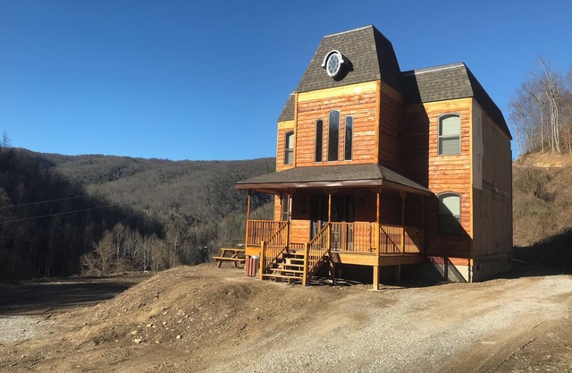 4BR 2 bath house with full kitchen, living room, hot tub and game room.