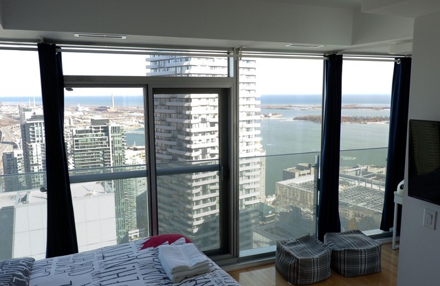 50th+ floor lake view condo beside CN tower