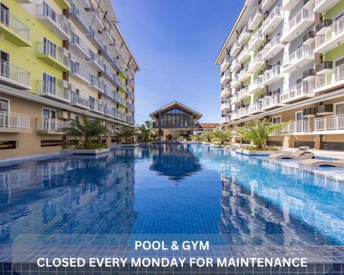 617A Condotel Near Airport &Mall with Pool,Gym,Netflix