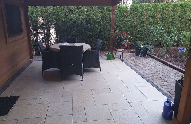 A 2 bedroom apartment with covered patio in the garden.
