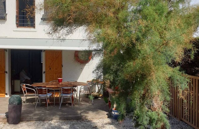 A blue house on the wild coast