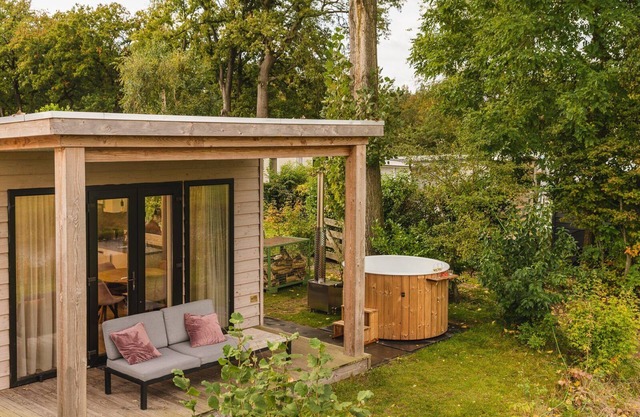 A lodge with hot tub and views over the Regge River. A sales pitch is really not necessary.