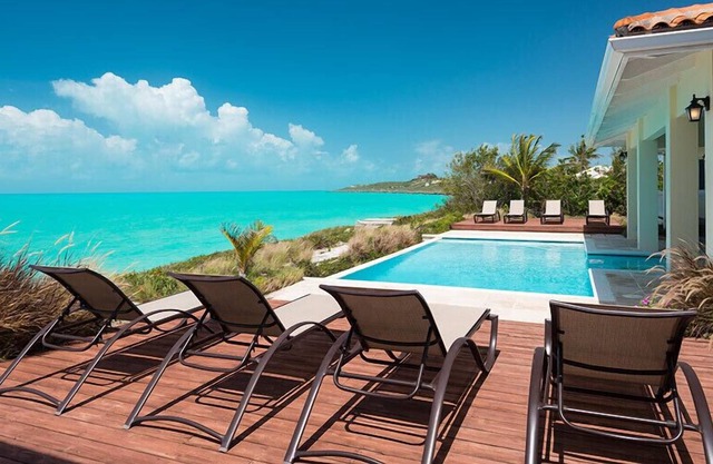 A Palm Tree Paradise at This Wonderful Oceanfront Villa
