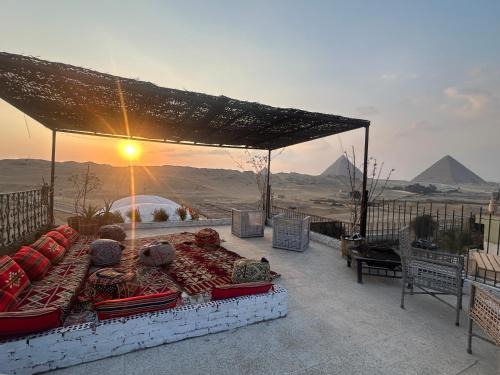A room in a horse farm with pyramid view from terraces