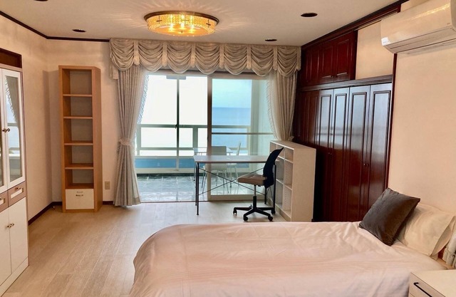 A triple room with a spectacular oceanfront view sunset right in front of you and plenty of amenit/Hamada Shimane
