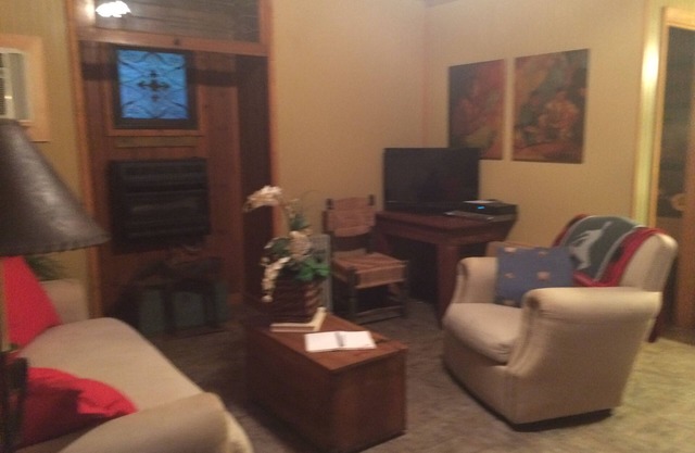 Accommodates 4 , one queen bed, one full. Bed, sleeper sofa