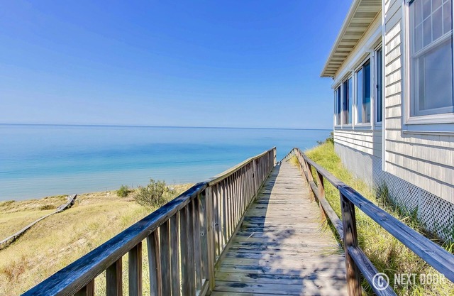 Amazing Lake Michigan Waterfront Custom Home With 186’ Of Perfect Sandy Beach!