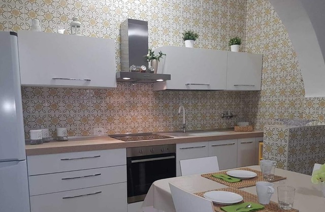 an apartment located on the ground floor of a villa one km from the sea
