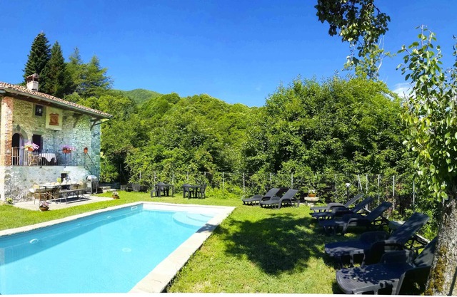 Ancient house in the medieval village surrounded by chestnut trees