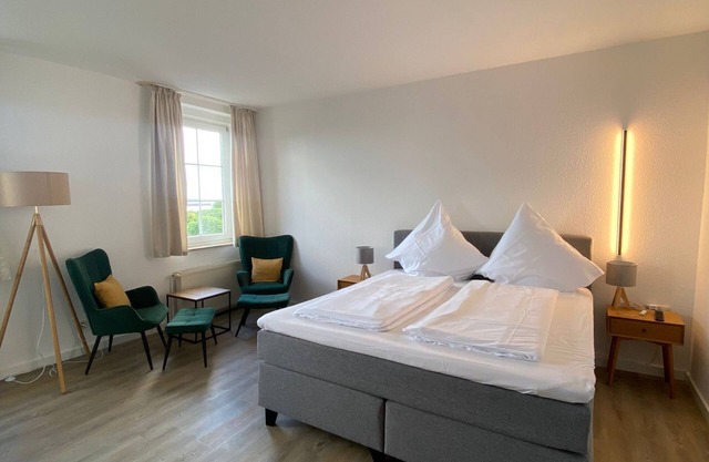 AP 2 Zimmer mit Kingsize-bett und Seeblick