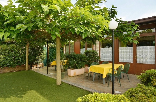 Apartment 6 with patio, pool, soccer field and gated parking lot