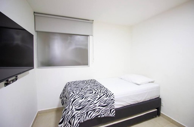 Apartamento acogedor con amplio estacionamiento 202