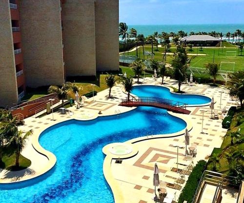 Apartamento em Condomínio Resort vizinho ao Beach Park