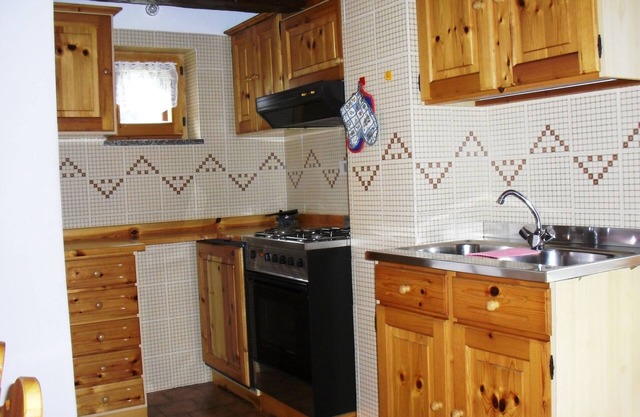 Apartment 'Baita Misseroni Quadrilocale' with Shared Garden