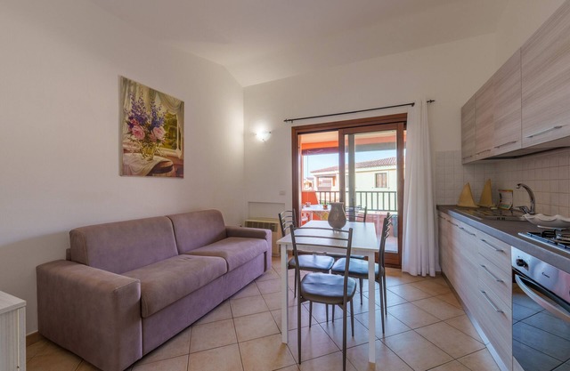Apartment 'Casa Vacanze Susino' with Shared Pool, Private Terrace and Air Conditioning
