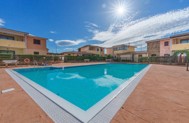 Apartment 'Casa Vacanze Uva' with Shared Pool, Private Terrace and Air Conditioning