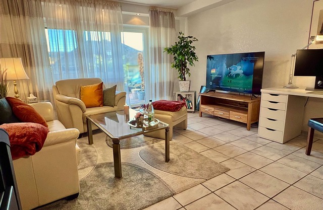 Apartment GoodTimes, ground floor, 2 x 50" TV, Netflix, south-facing terrace w. Access to the parking lot