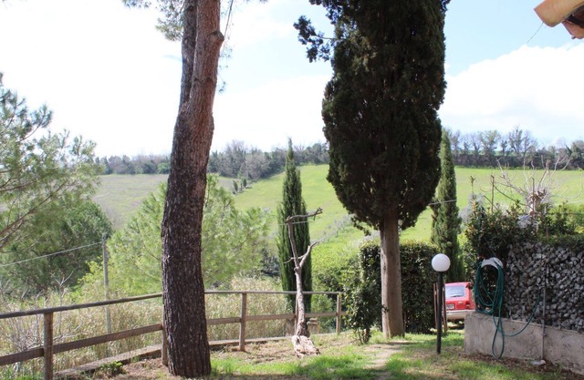apartment in a renovated farmhouse surrounded by greenery