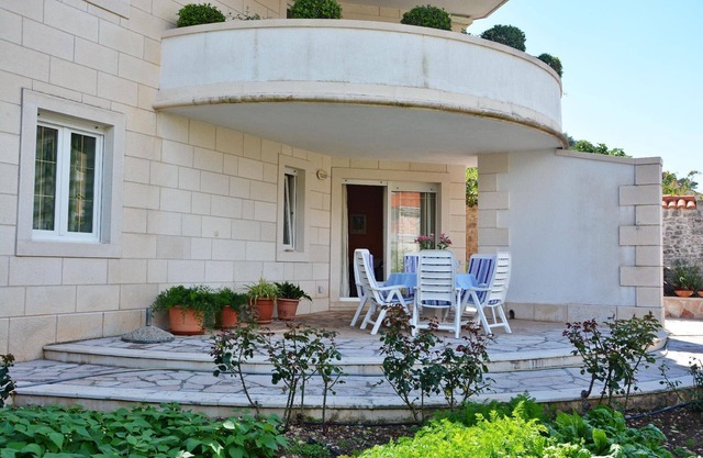 Apartment in Pučišća with Barbecue, Terrace and Garden and Magnificent View