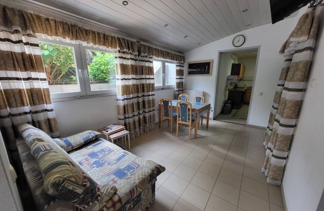 Apartment with bedroom and living area.