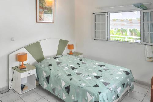 Appartement convivial au Moule avec jardin clôturé