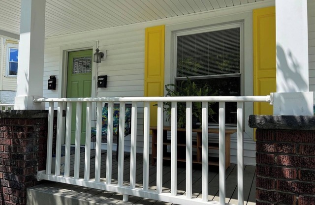 Apt A The Yellow Shuttered House