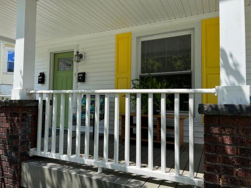 Apt A The Yellow Shuttered House